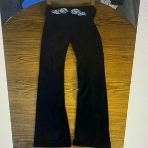 Black Flared Pants with White Floral Detail